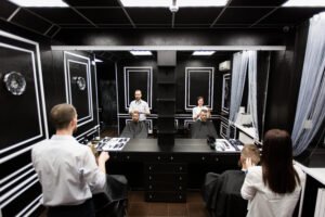 Work in a barbershop. Two masters at work.